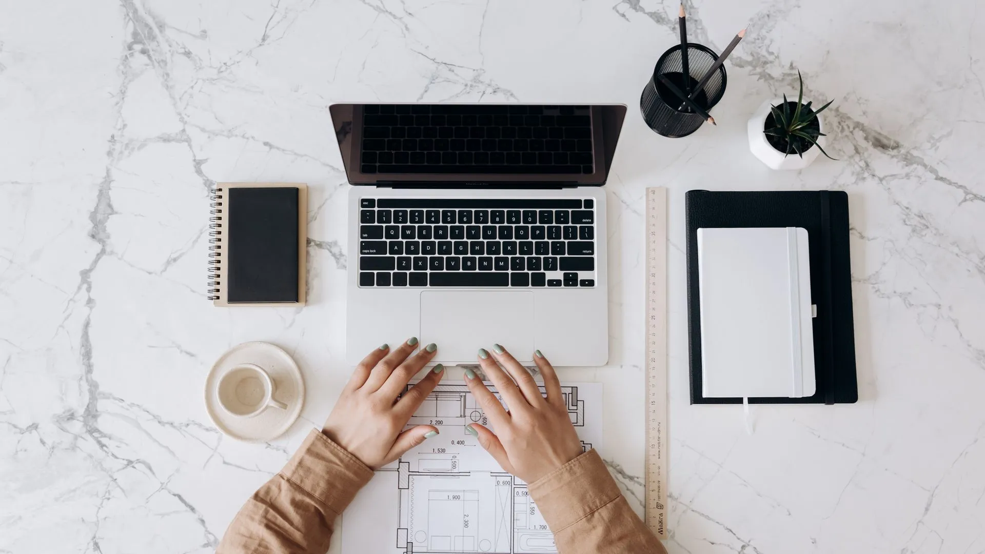 Person working on a laptop at home
